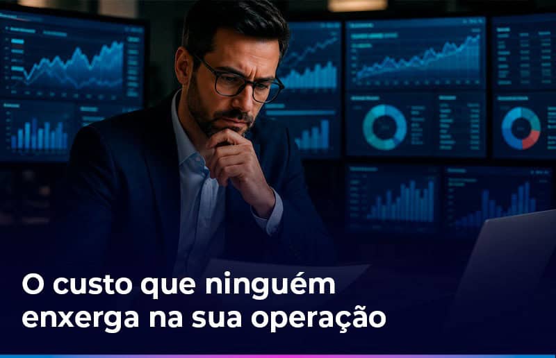 Executivo analisando indicadores financeiros e fluxos de pagamentos em múltiplas telas, representando os custos invisíveis e as ineficiências ocultas na operação de pagamentos de empresas.